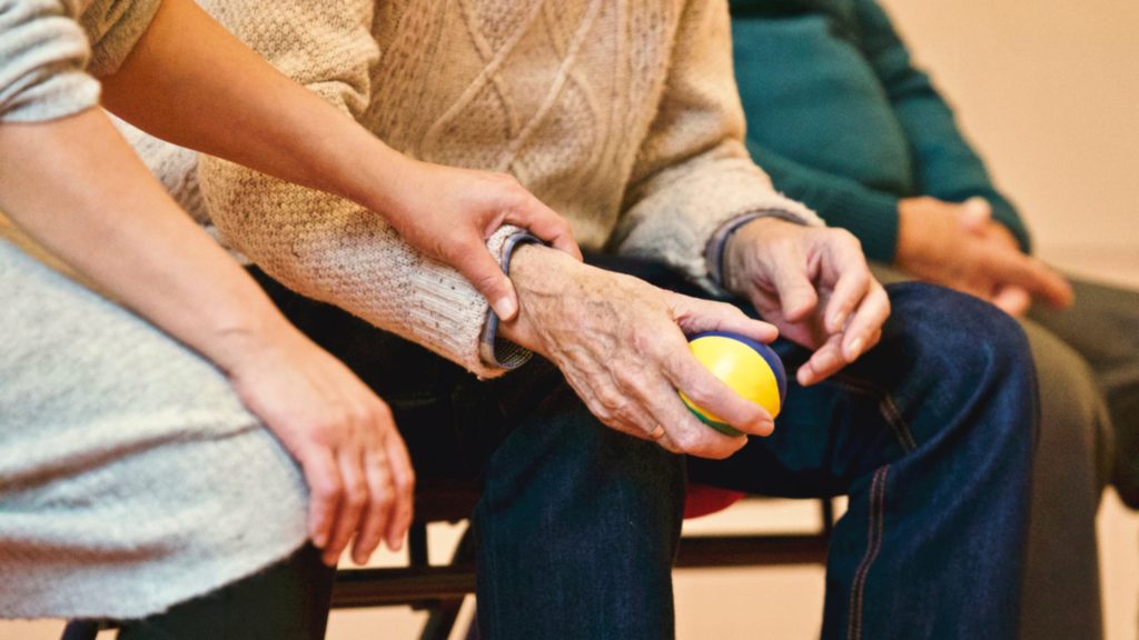 close up of elderly in therapy during adult care